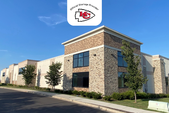 Facility exterior with a Kansas City Chiefs partnership logo at StorageMart in Overland Park Kansas